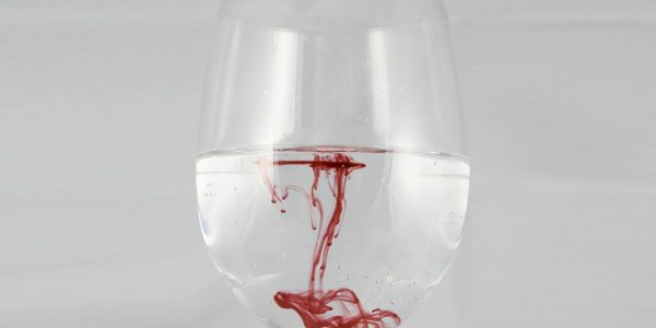 Blood in water in Wine Glass- alcohol Kills